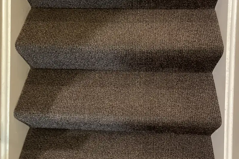After: the same carpet after truck-mounted hot water extraction by our Chicago office