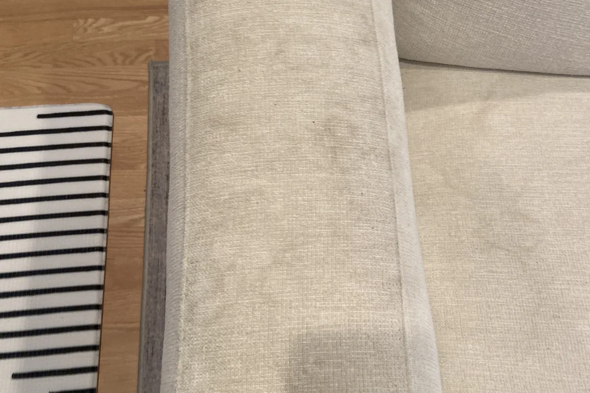 Stained carpet before cleaning in a Niles home