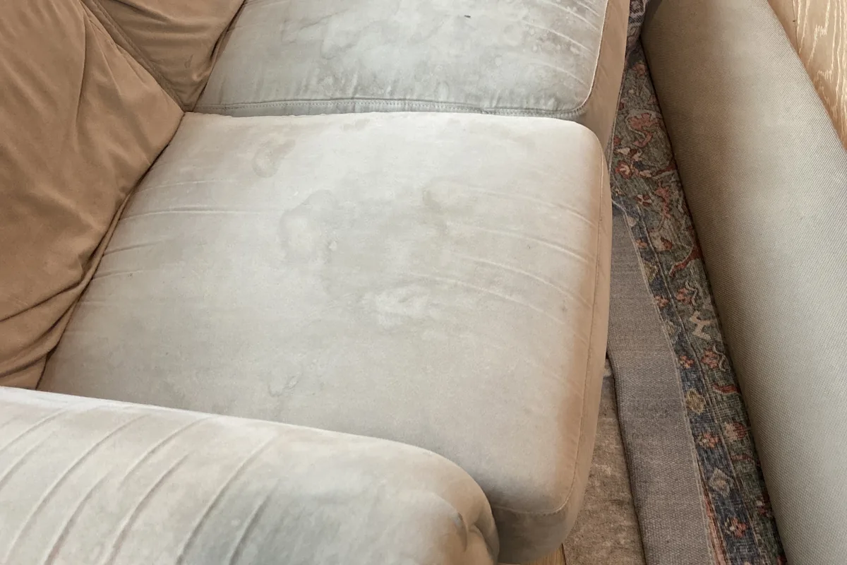 Stained carpet before cleaning in a Roselle home