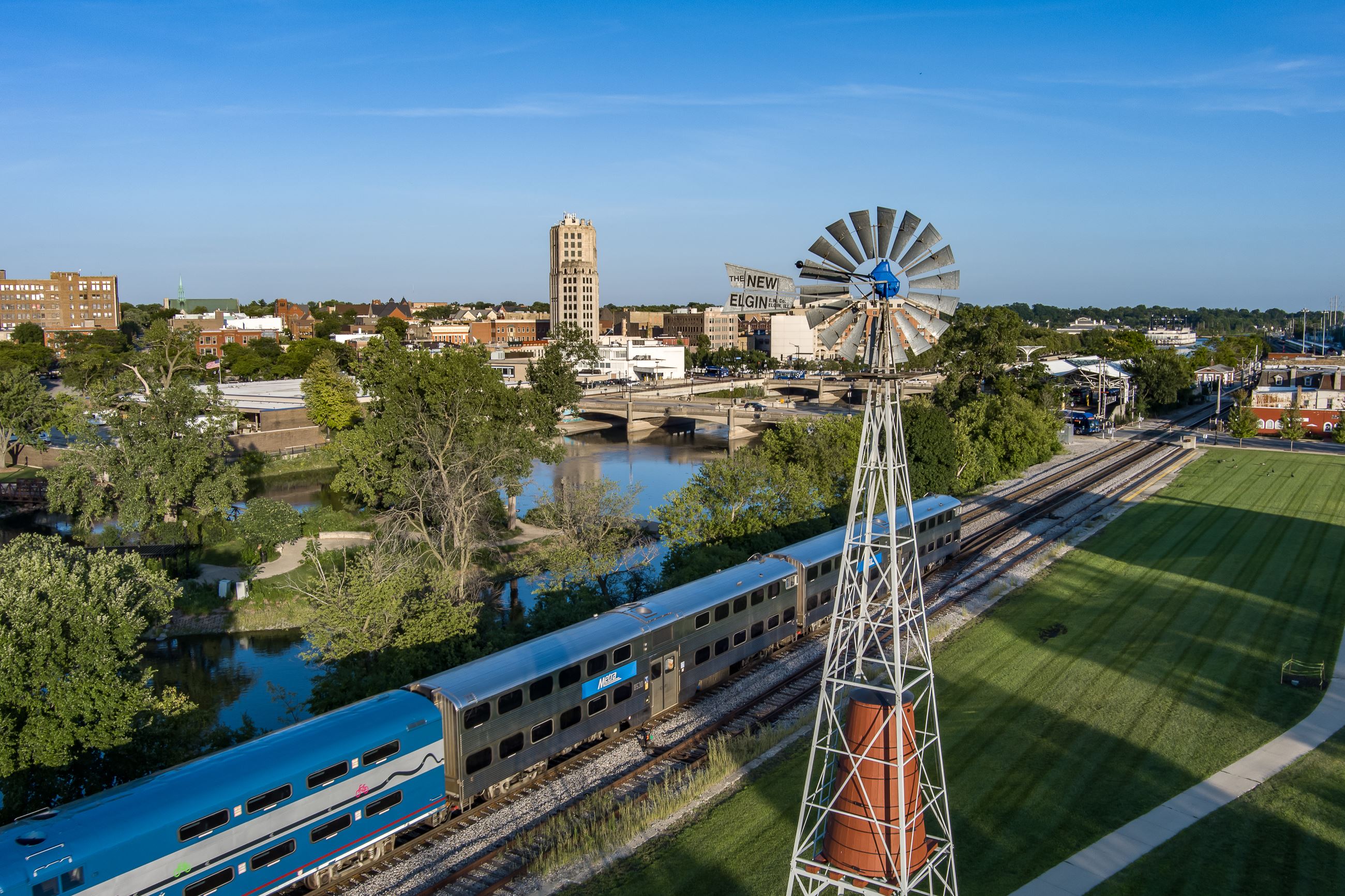 Elgin IL Fox River skyline and Metra line — carpet cleaning service area