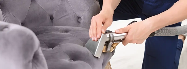 carpet cleaner working on chair cleaning