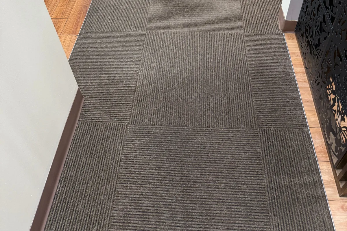 Small second-floor lobby, about fifty square feet of carpet tile, after cleaning