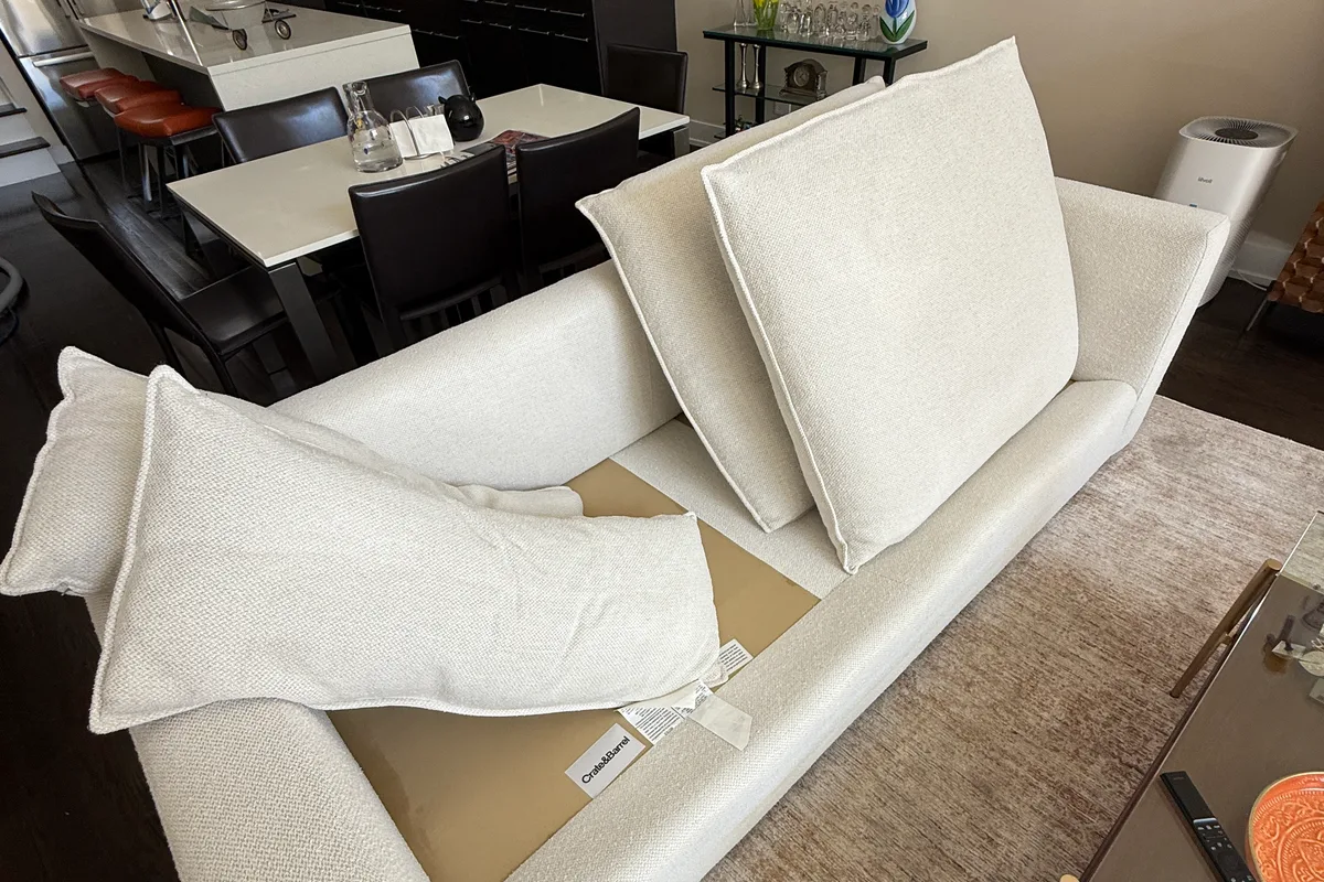 Sofa arm and back cushion cleaned by hot water extraction in a Chicago living room