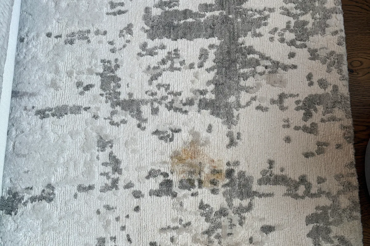 Sofa seat cushions and arms showing general soiling before upholstery cleaning in Chicago