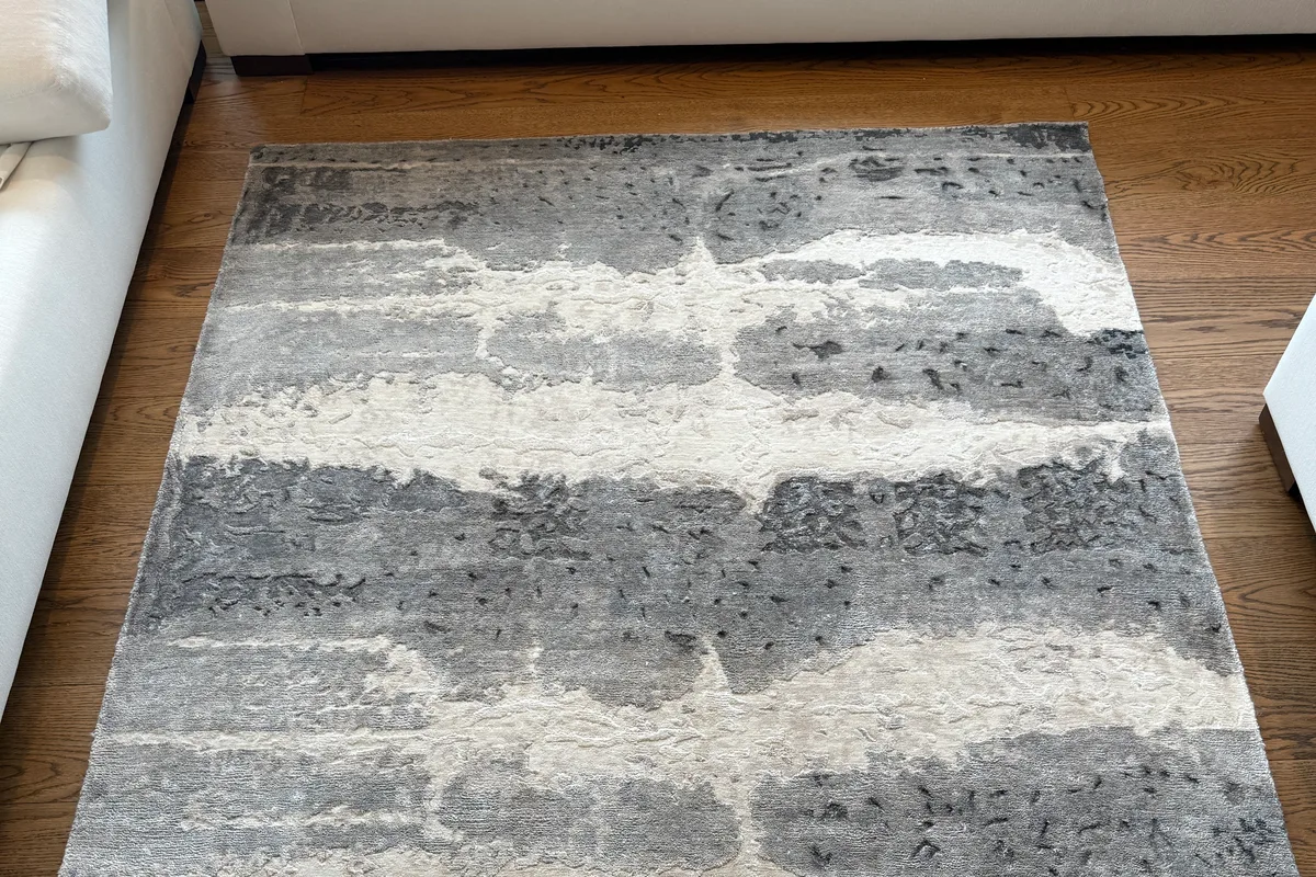Sectional piece arm and cushion face during upholstery hot water extraction